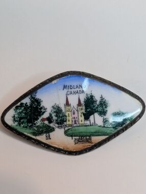 Vintage hand-painted enamel brooch featuring Martyrs' Shrine "MIDLAND